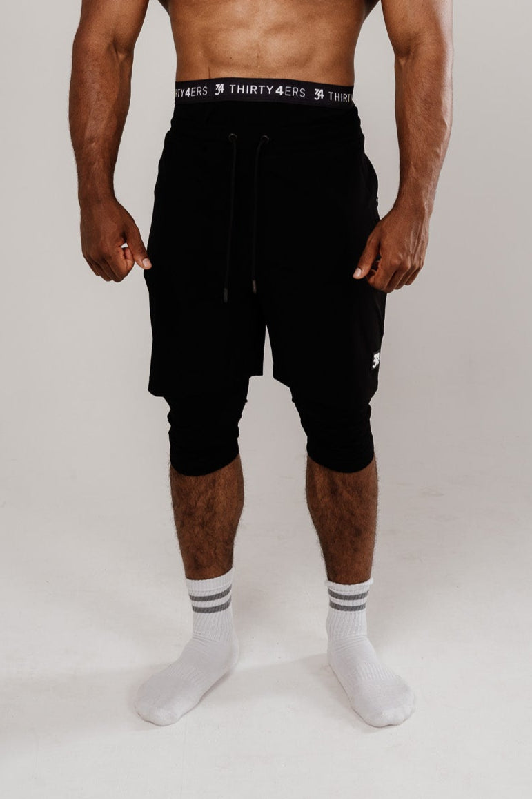 AWRAH 3/4 Length Gym Shorts - Image 1